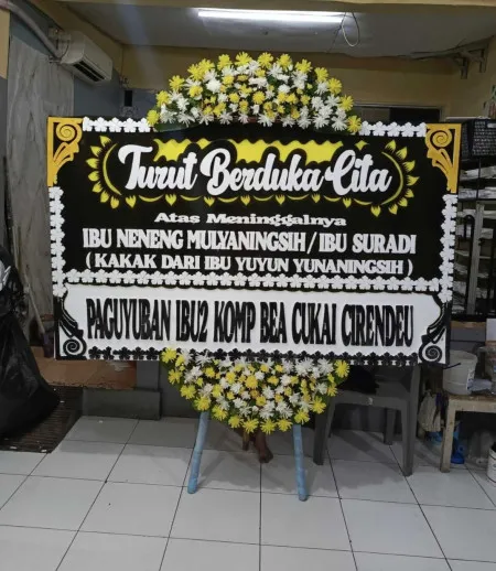 Papan Bunga Duka Tangkisan Bayan