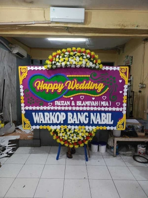 Papan Bunga di Tangkisan Bayan