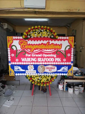 Papan Bunga di Tangkisan Bayan